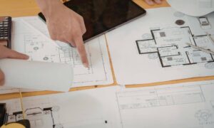 Reviewing property plans and documents while preparing an ALTA survey scope for a closing