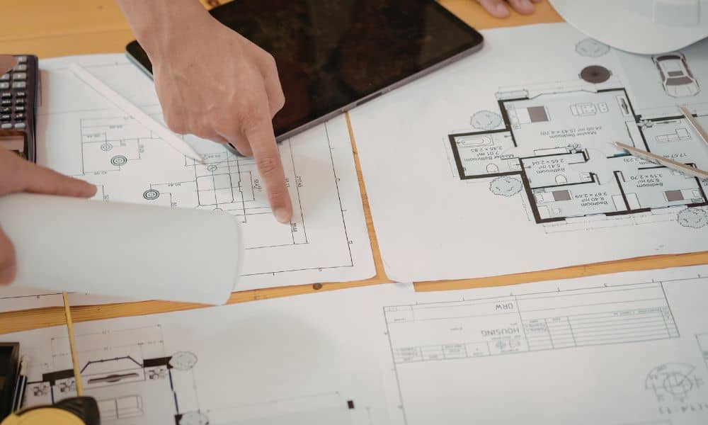 Reviewing property plans and documents while preparing an ALTA survey scope for a closing