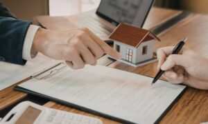 Buyers reviewing documents during due diligence before ordering an ALTA title survey