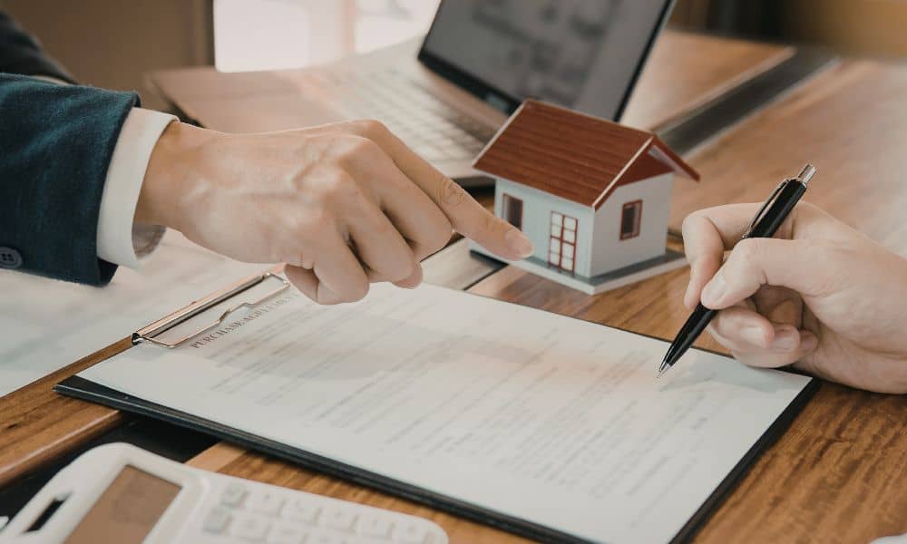 Buyers reviewing documents during due diligence before ordering an ALTA title survey