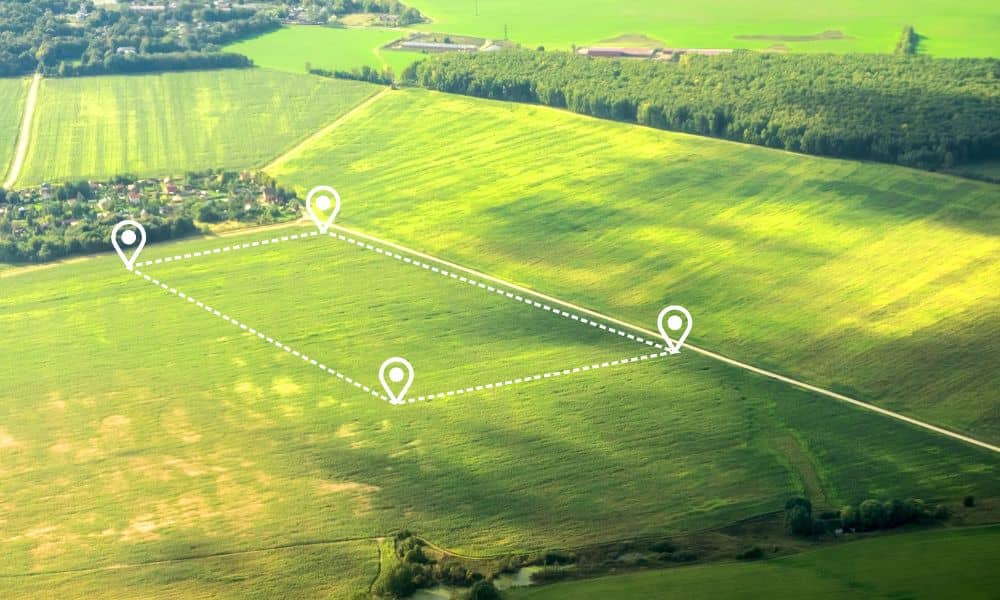 Aerial view of farmland with marked property lines used for an ALTA title survey